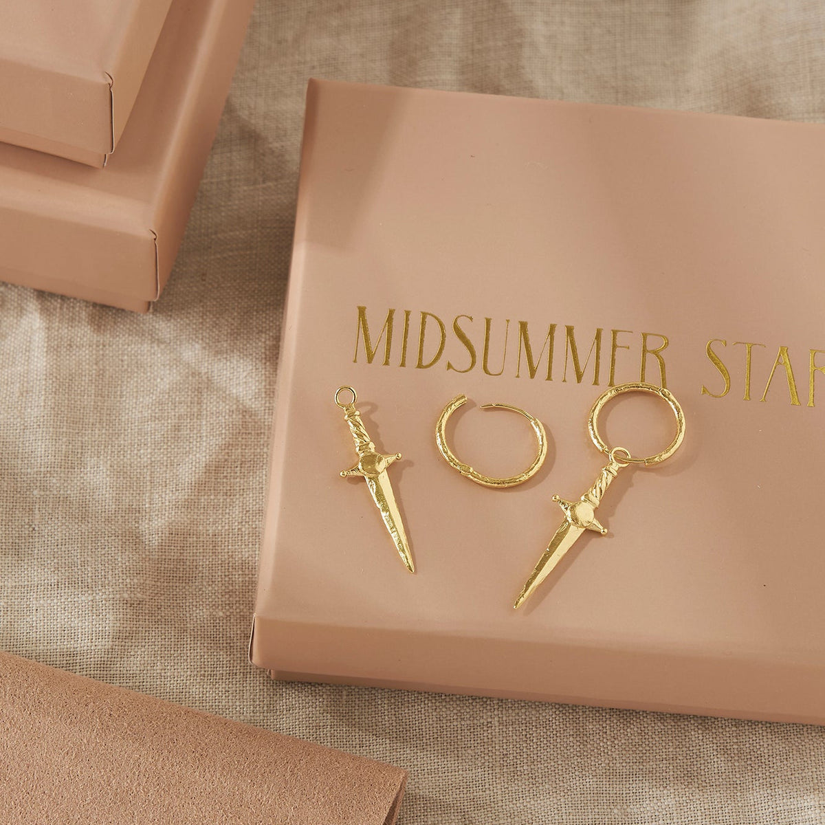 Guardian Dagger Huggies Gold