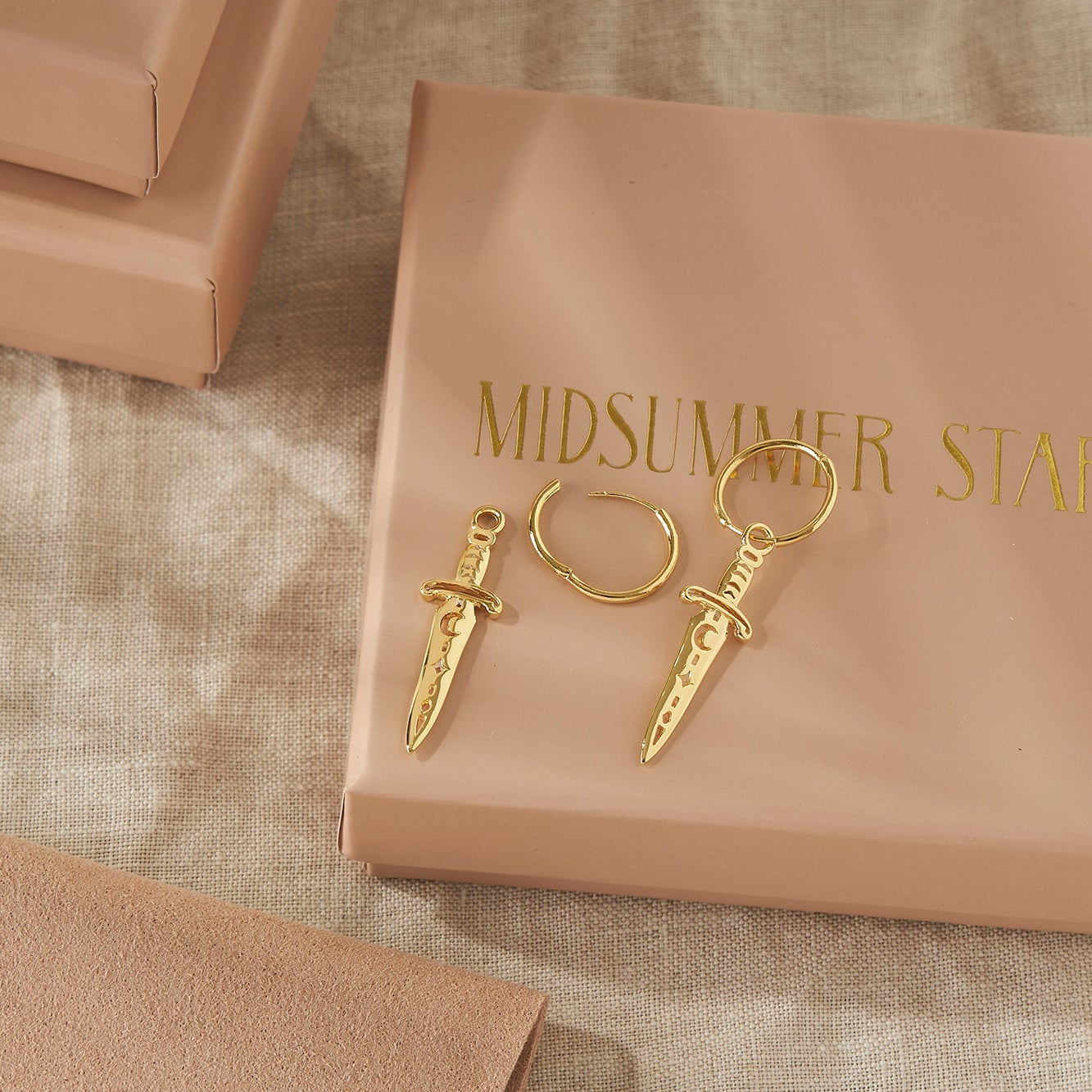 Celestial Sword Huggies Gold