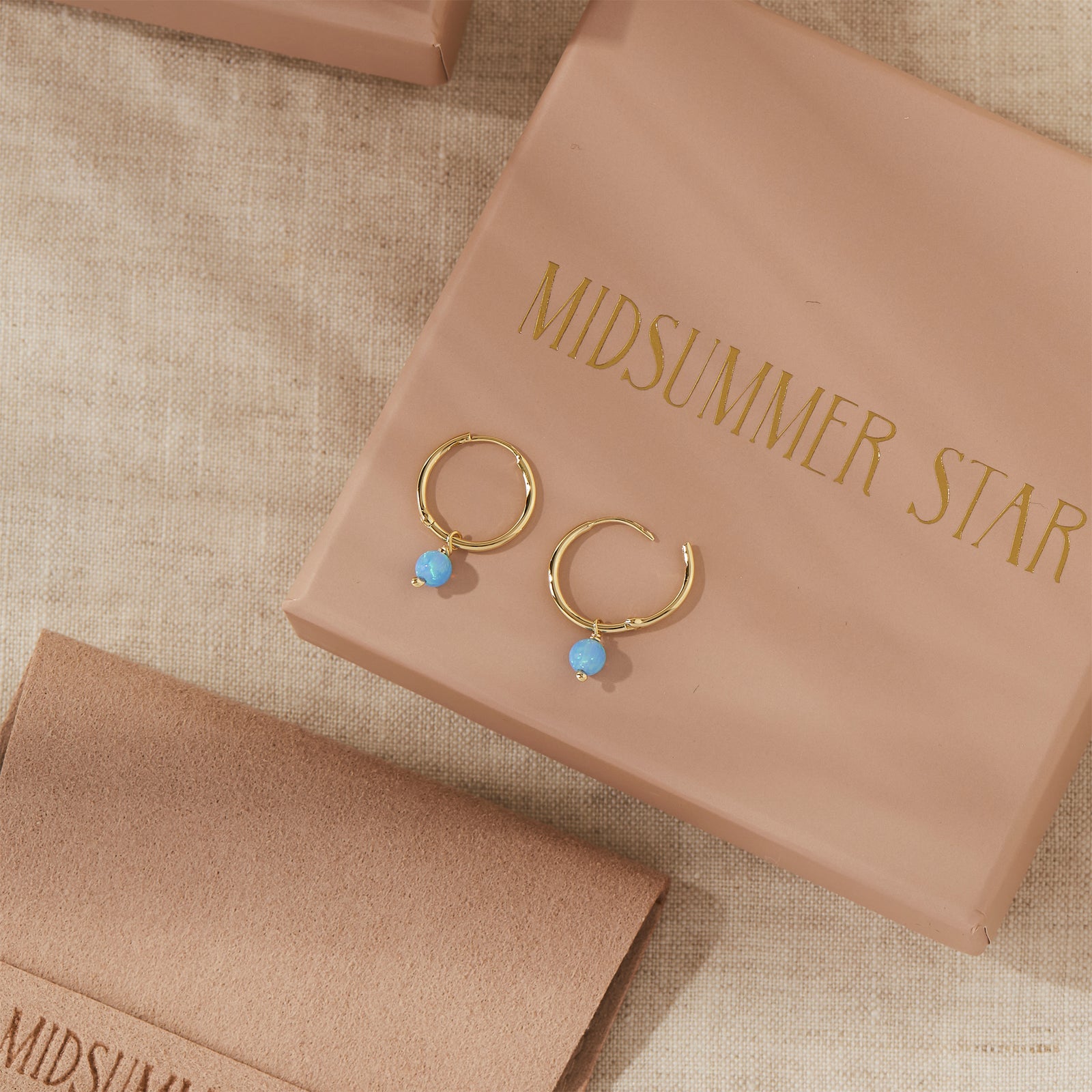 Dainty Azure Opal Huggies Gold