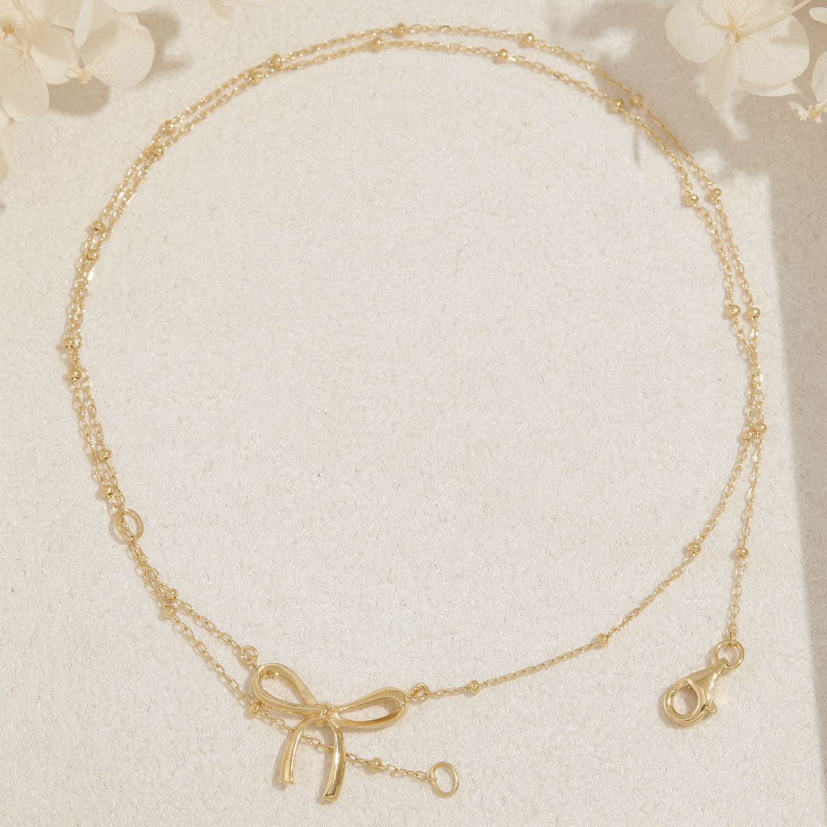 Disco Bow Necklace Gold