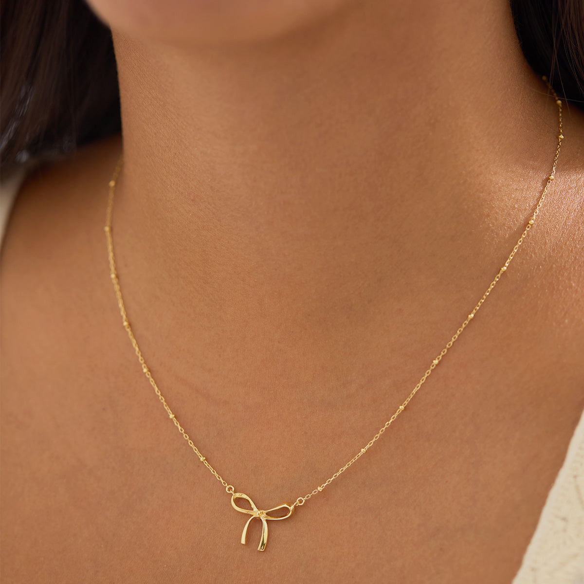 Disco Bow Necklace Gold