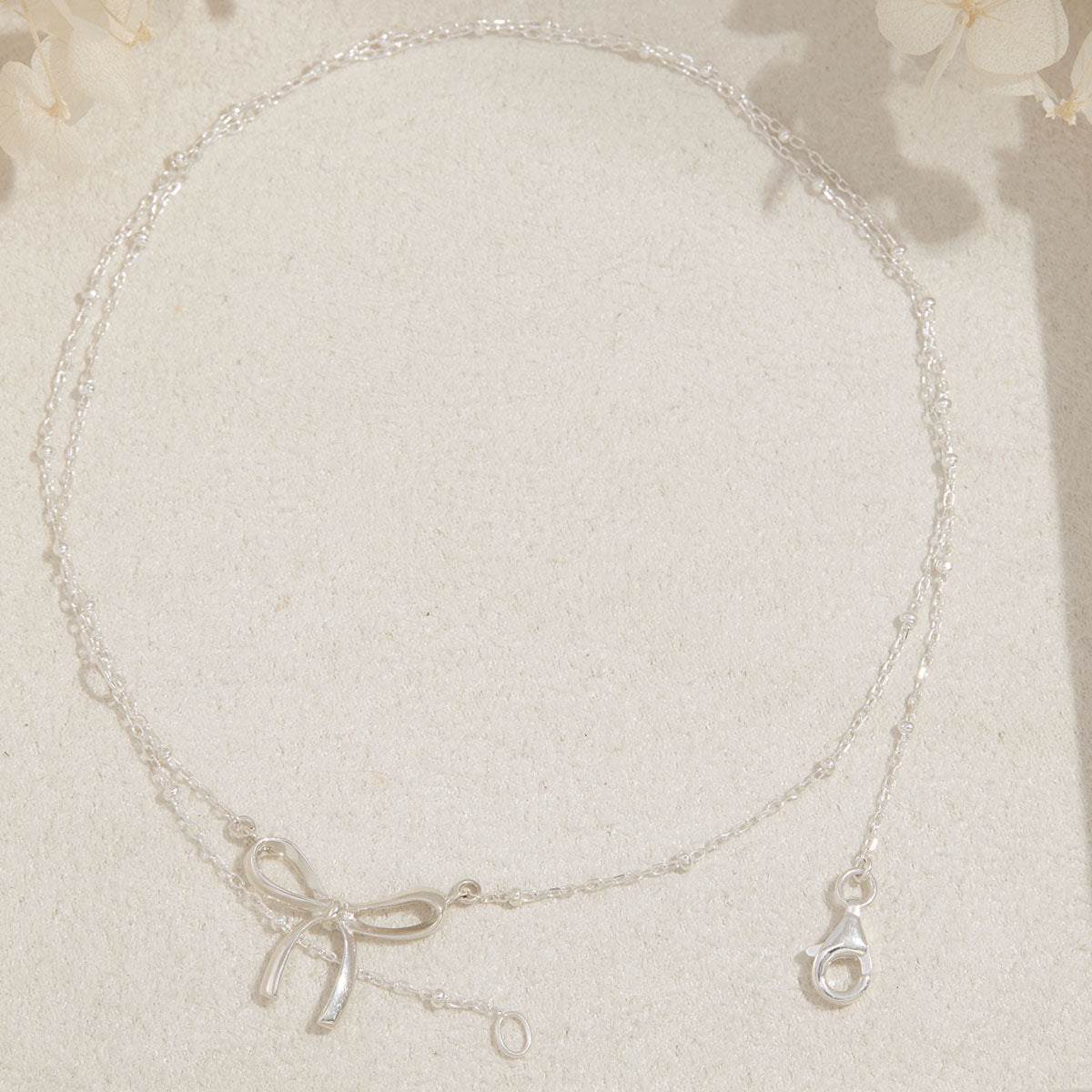 Disco Bow Necklace