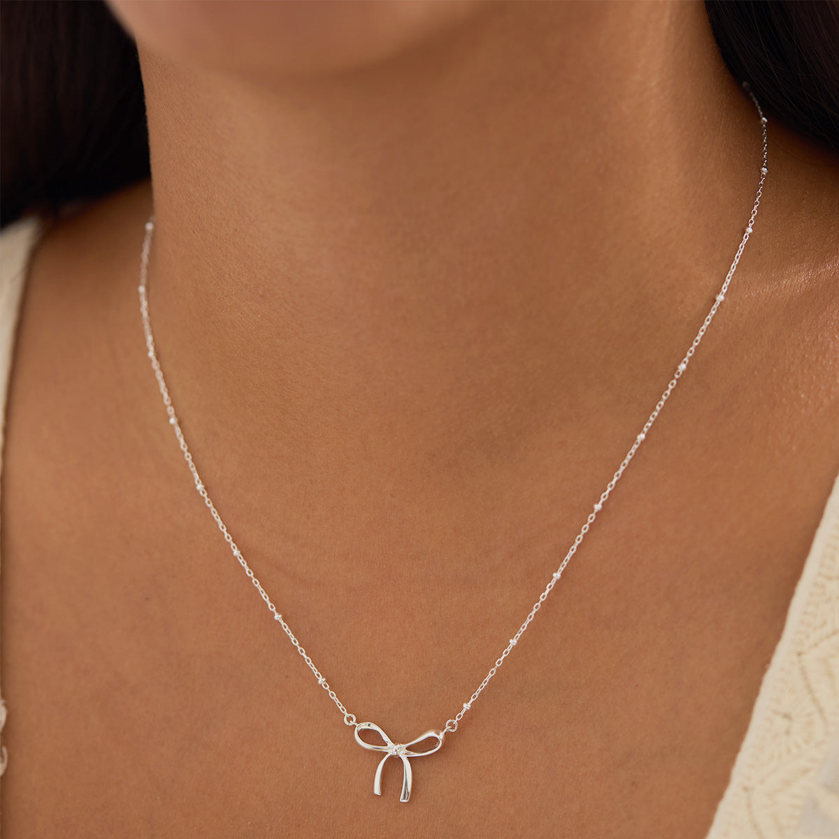 Disco Bow Necklace