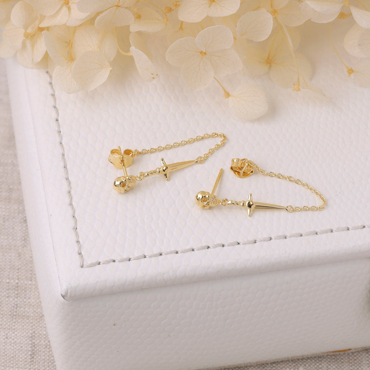 Dagger and Skull Chain Studs Gold