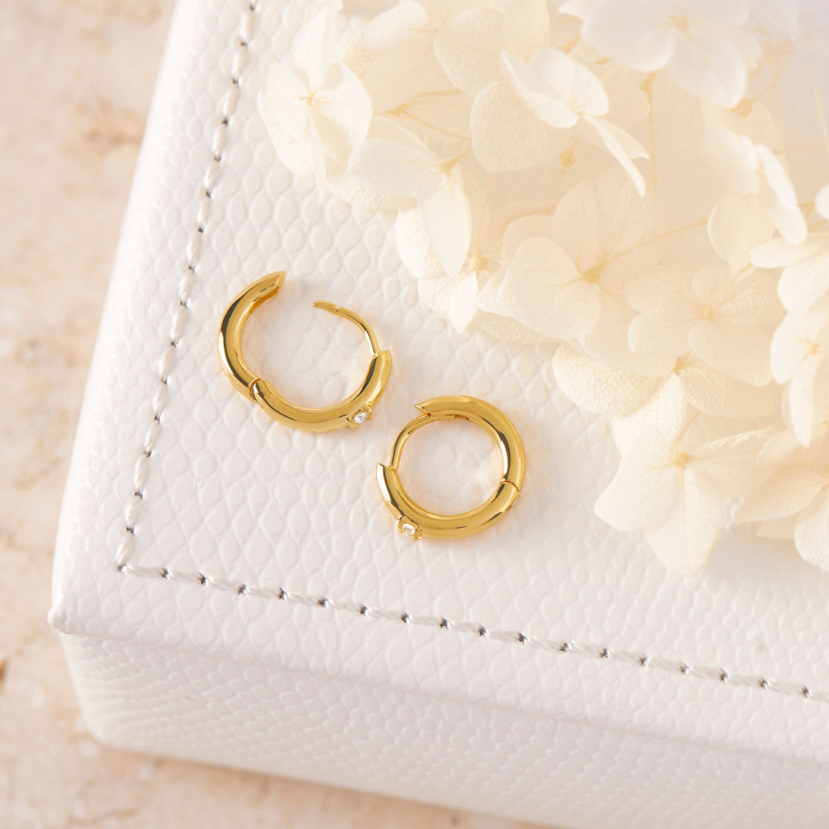 White Topaz Comet Huggies Gold