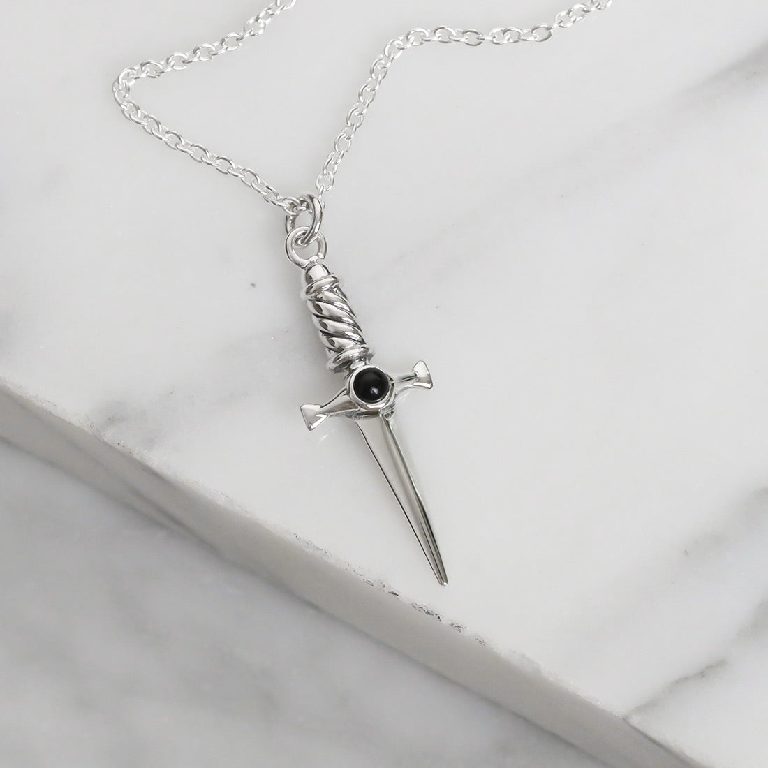 Cosmic Dagger Onyx Charm